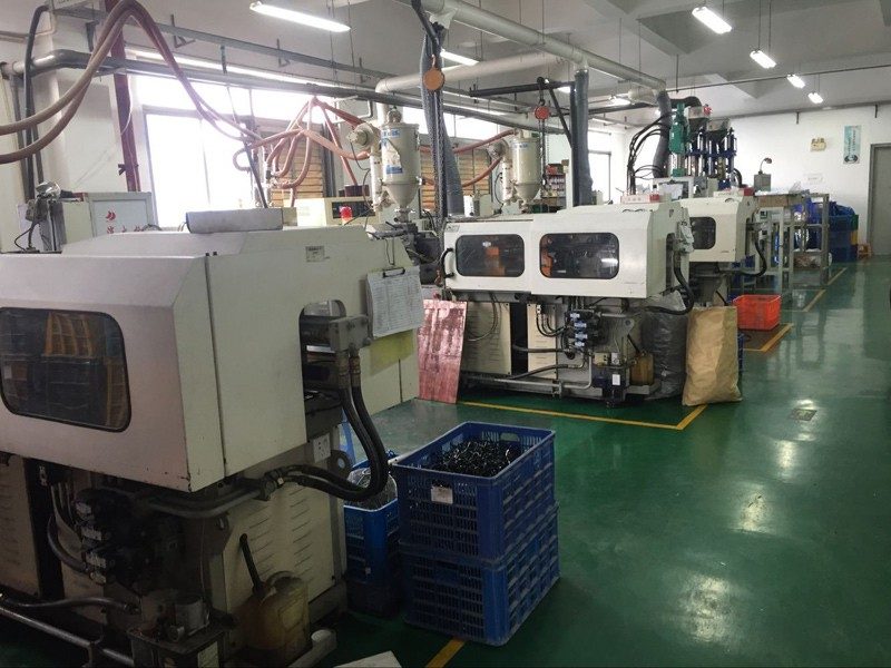 Injection moulding machines on the shop floor. Photograph from the Jiayu factory pages.
